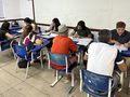 A Serf orienta moradores durante o mutirão de regularização no Bacuri, etapa essencial para garantir o direito à moradia legalizada.