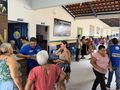 Moradores buscam informações e realizam cadastro para regularização de imóveis durante o mutirão.