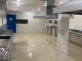 Cozinha ganhou novas pias, bancadas e novo piso cerâmico, além do sistema de exaustores